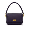 A dark purple leather shoulder bag with a gold-tone metal clasp and gold hardware, shown against a plain white background.
