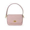 A light pink leather shoulder bag with a top handle, gold-tone hardware, and a front flap featuring a gold logo clasp, shown on a plain white background.