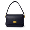 A navy blue leather shoulder bag with a gold-tone turn-lock clasp and gold hardware, shown on a plain white background.